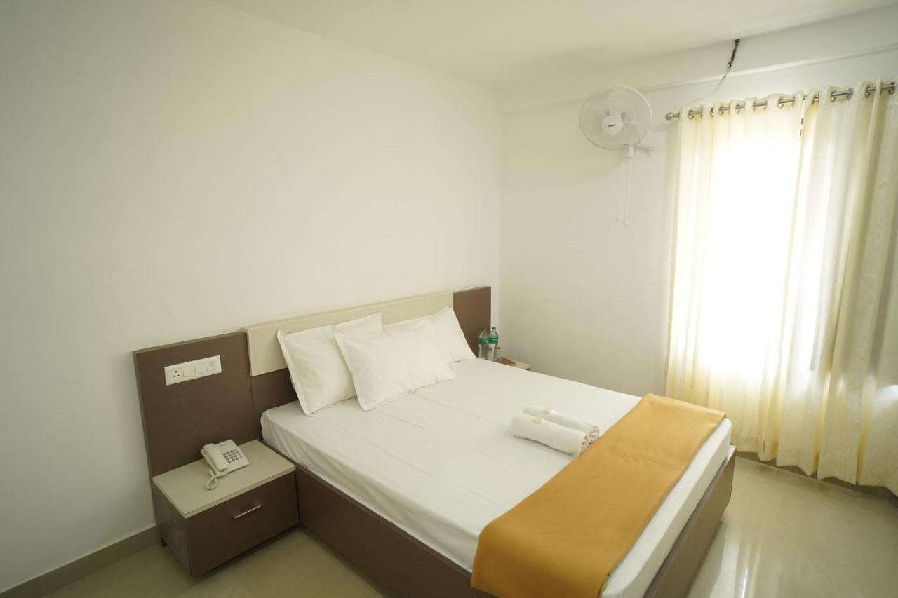 Sn Rooms Perumpavur Bagian luar foto