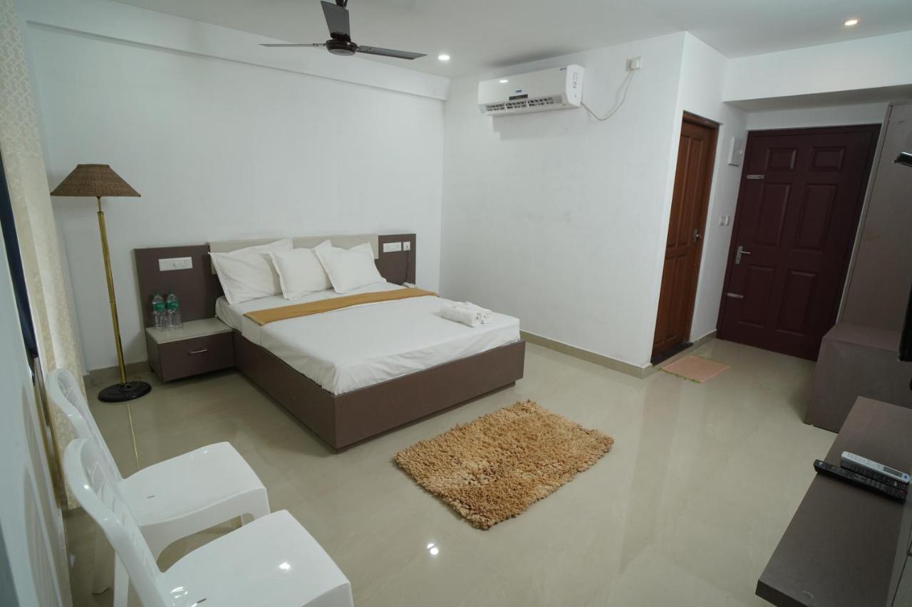 Sn Rooms Perumpavur Bagian luar foto