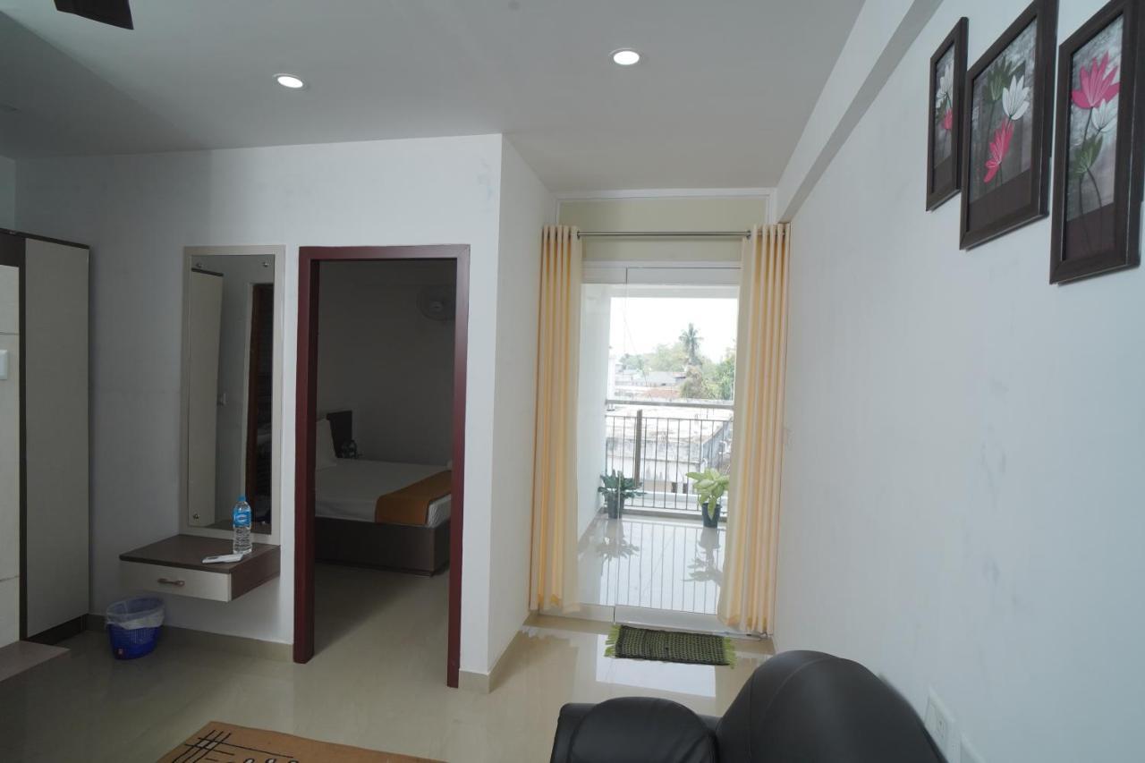 Sn Rooms Perumpavur Bagian luar foto
