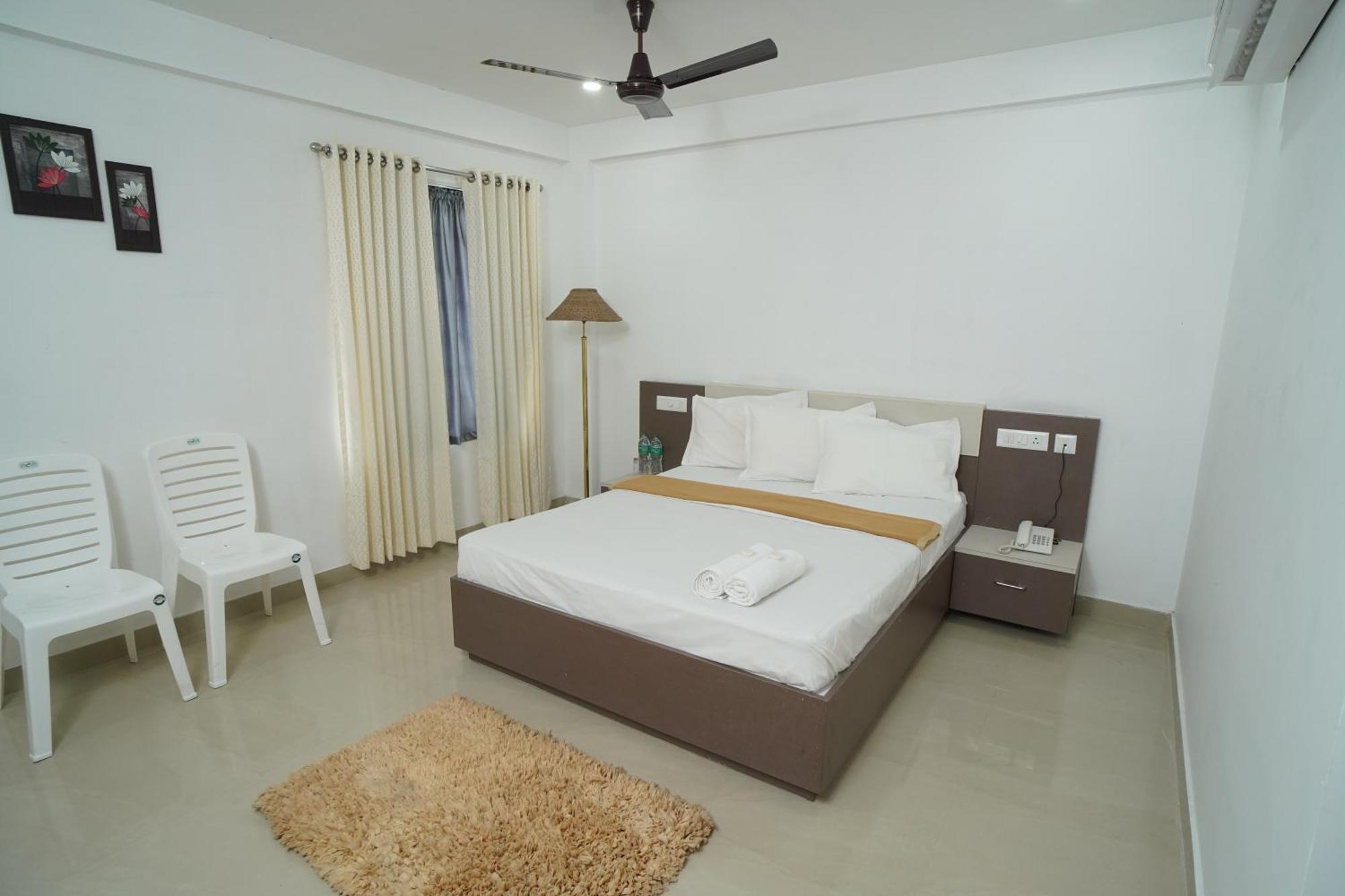 Sn Rooms Perumpavur Bagian luar foto